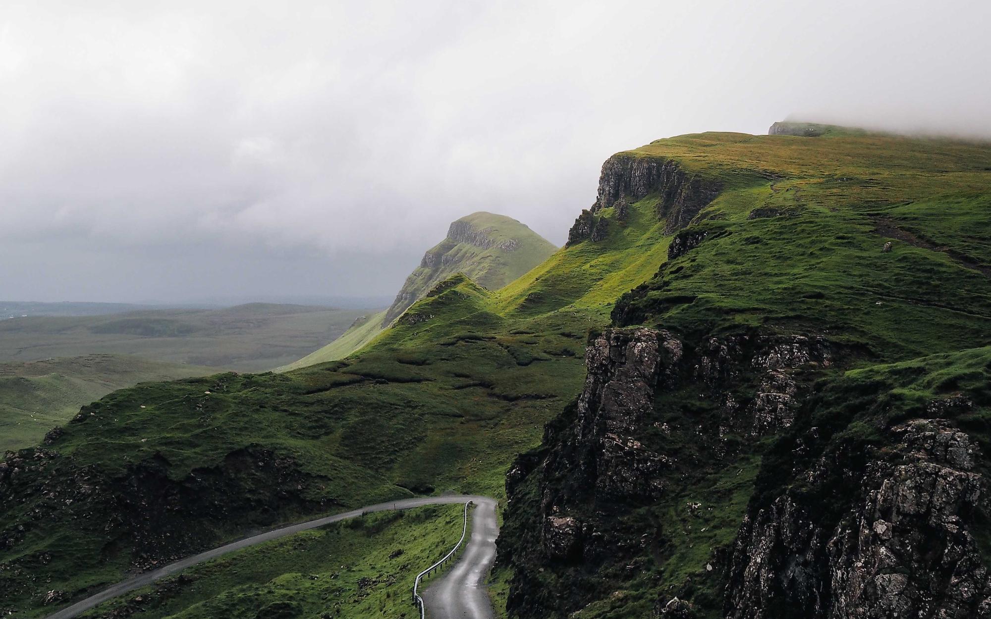 Road winding through highland terrain